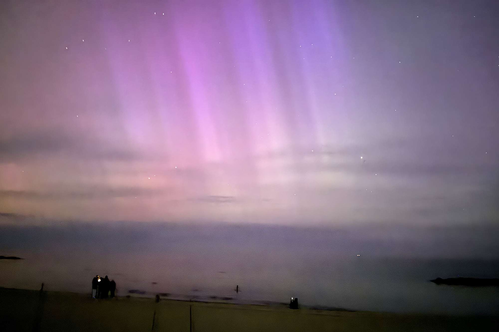 LISELEJE, DENMARK - MAY 11: Northern lights (Aurora Borealis), also known as aurora, colorful lights shift, illuminate the sky in Liseleje, Denmark on May 11, 2024. 