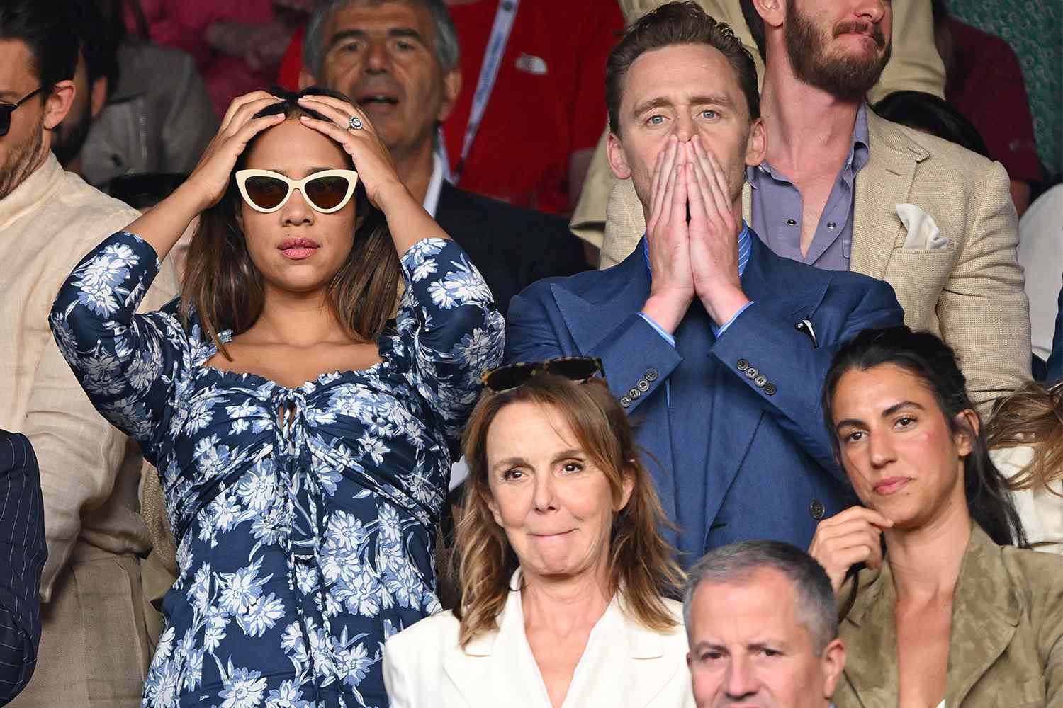 Zawe Ashton and Tom Hiddleston watch Carlos Alcaraz vs Novak Djokovic in the Wimbledon 2023 men's final on Centre Court during day fourteen of the Wimbledon Tennis Championships at the All England Lawn Tennis and Croquet Club on July 16, 2023 in London, England. 