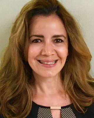 Photo of Graciela Aires Rust, PhD, MS, LCMHC, CRC, IWLC, Licensed Professional Counselor