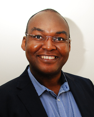 Photo of Edy-Claude Okalla Bana, PhD, TCF, TS, PA, Registered Psychotherapist