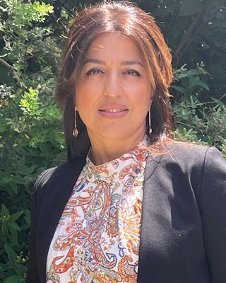 Photo of Masoumeh Minou, PhD, MBACP, Psychotherapist