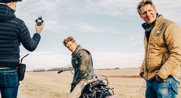 Austin Butler and director Jeff Nichols filming on location for The Bikeriders (2024)