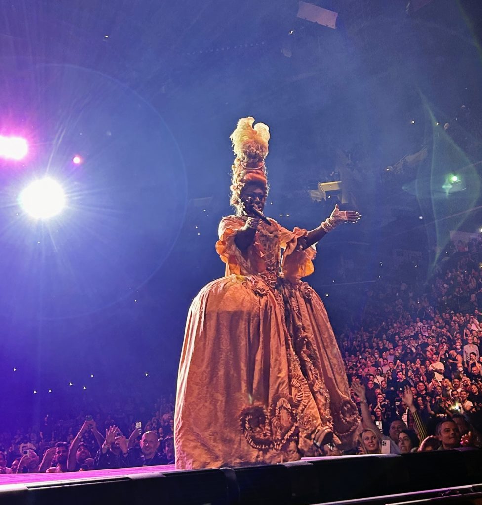 Bob the Drag Queen in a 1800s outfit getting the crowd started. (Copyright Randee Dawn 2023)