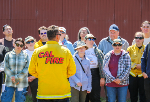 firefighter addressing a crowd