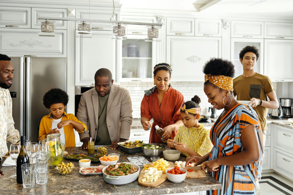 family gathered around the kitchen for dinner