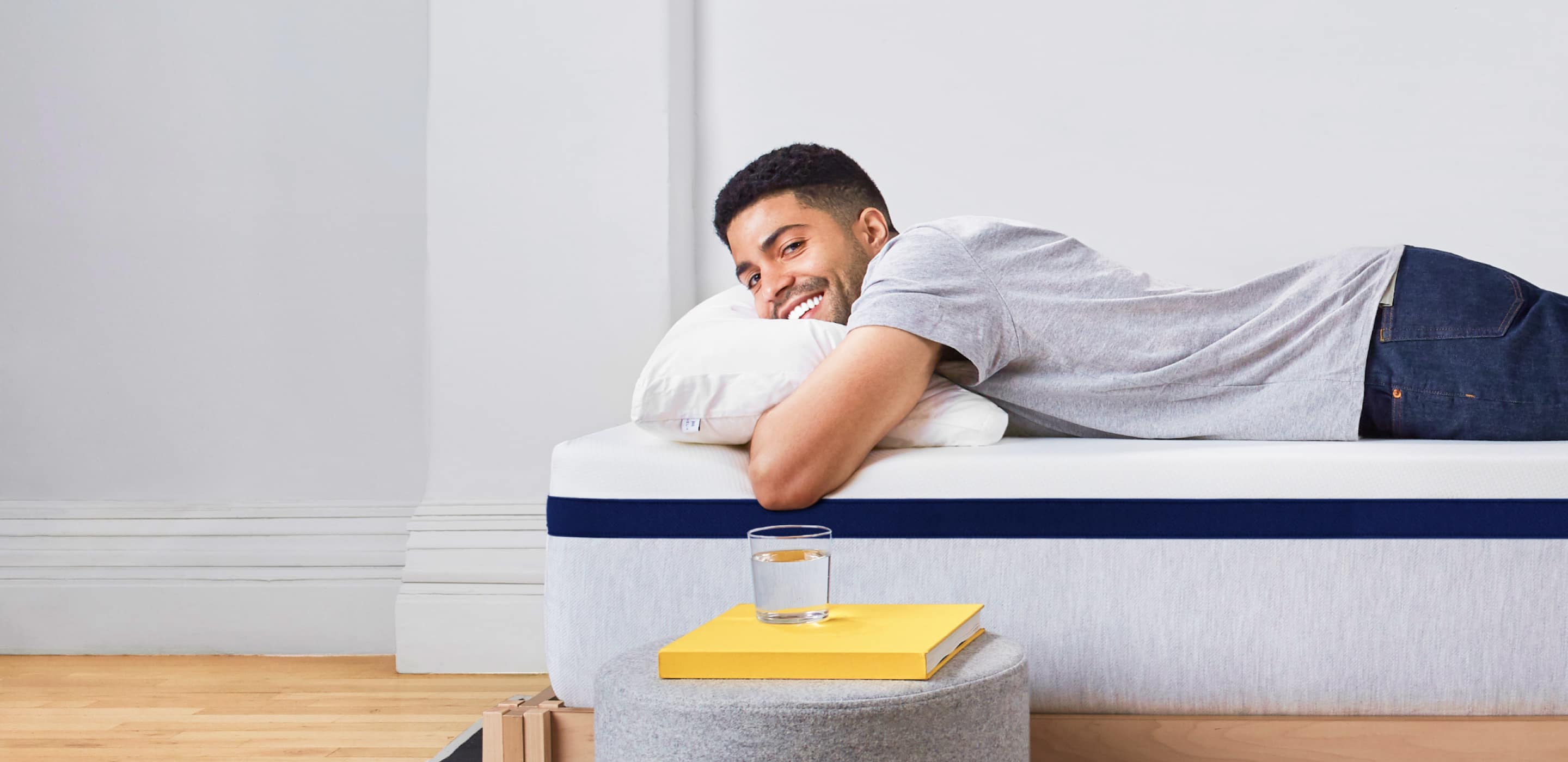 Man Resting on Helix Midnight Mattress