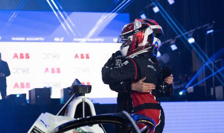 Wehrlein hugs Dennis at the Diriyah podium