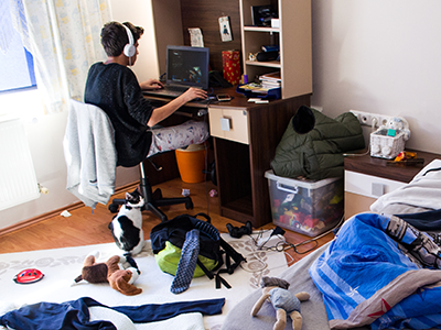 teen in bedroom