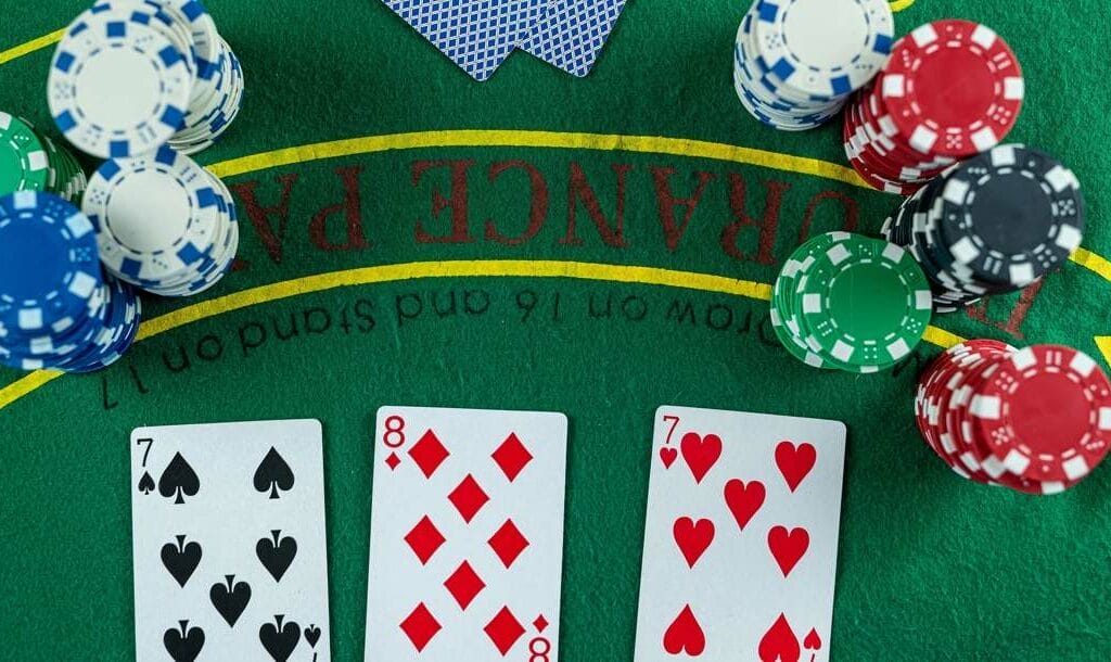 Poker cards with three of a kind or set combination