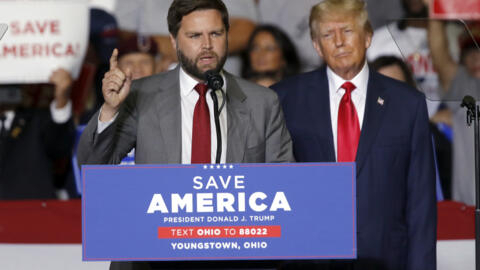 JD Vance is accompanied by former president Donald Trump as he speaks at a campaign rally in Youngstown, Ohio, on September 17, 2022.