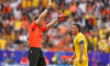 Munchen, Germany. 02nd July, 2024. MUNCHEN, GERMANY - JULY 2: Referee Felix Zwayer shows a yellow card to Nicolae Stanciu of Romania during the UEFA EURO 2024 Round of 16 match between Romania and Netherlands at Allianz Arena on July 2, 2024 in Munchen, G