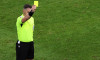 Hamburg, Germany. 26th June, 2024. Soccer: Football, UEFA Euro 2024, European Championship, Czech Republic - Turkey, Preliminary round, Group F, Matchday 3, Volksparkstadion Hamburg, Referee Istvan Kovacs from Romania shows a yellow card. Credit: Jens Btt