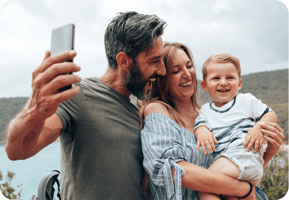 Family taking a selfie with a baby