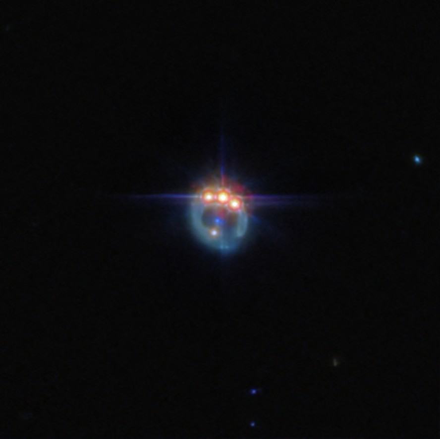 Na imagem capturada pelo James Webb, é possível visualizar o quasar RX J1131-1231 com suas lentes gravitacionais