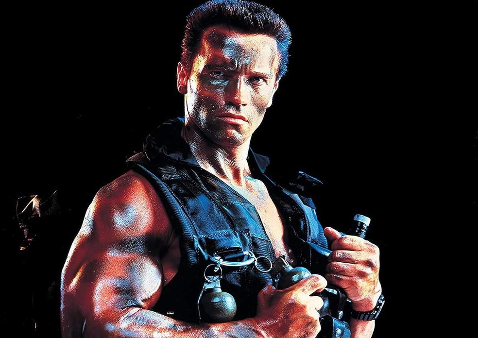 Arnold Schwarzenegger em 'Comando para Matar' — Foto: Divulgação