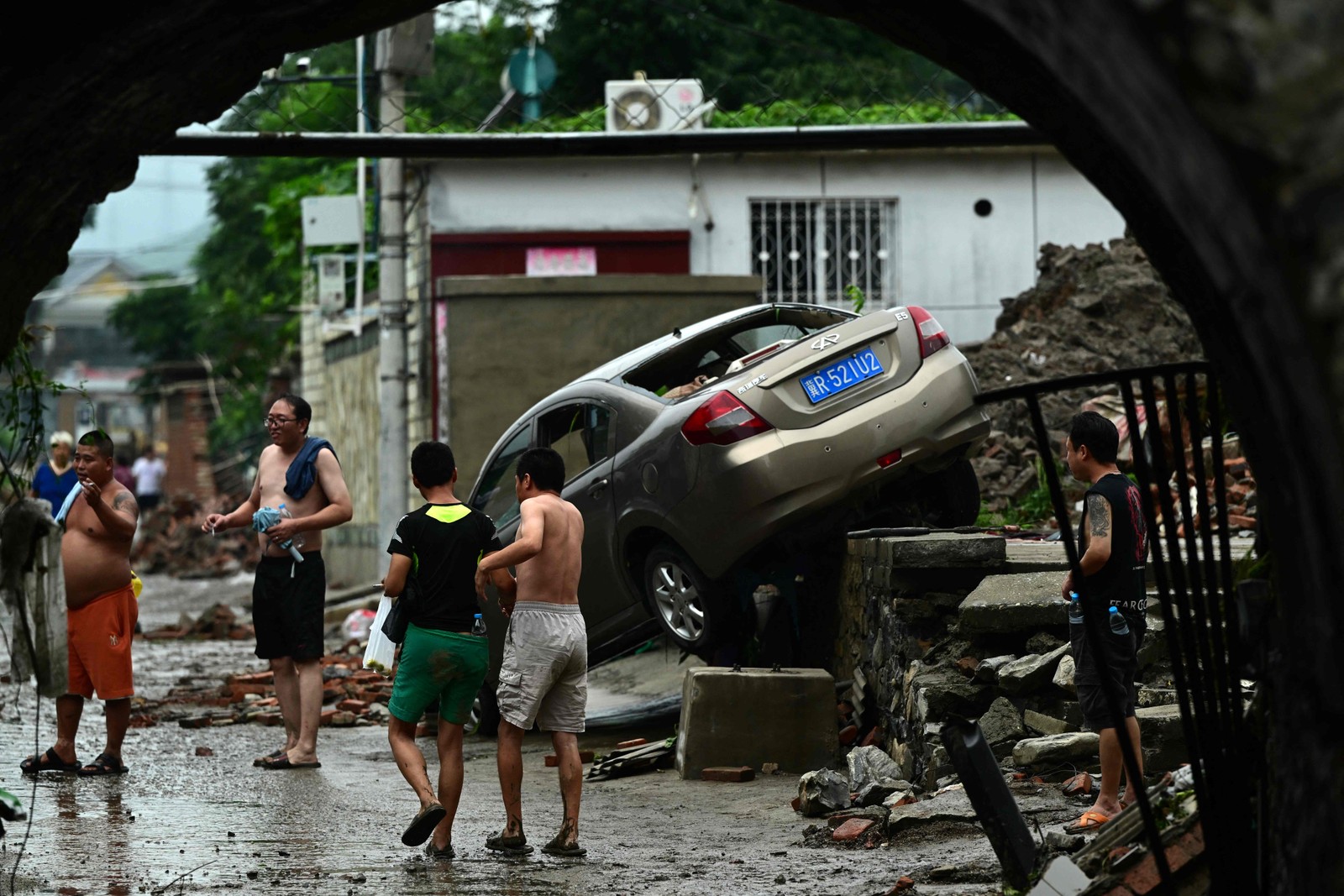 Chuvas que afetaram Pequim nos últimos dias foram as mais intensas em 140 anos desde o início dos registros das tempestades na China — Foto: Pedro PARDO / AFP