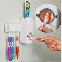 Espremedor de pasta de dente (AliExpress). O item visa dispensar a quantidade ideal de creme dental com apenas um toque, garantindo higiene e economia, além de ser um dispenser para escovas. Não requer eletricidade.