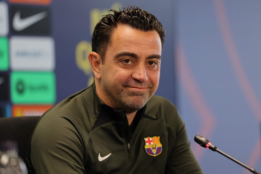 Barcelona's Spanish coach Xavi addresses a press conference at the Joan Gamper training ground in Sant Joan Despi, near Barcelona, on April 25, 2024. Xavi will remain as coach of Barcelona, the Spanish giants told AFP on April 24, despite having announced in January that he planned to quit at the end of the season due to the 'cruel and unpleasant' nature of the job. (Photo by LLUIS GENE / AFP)