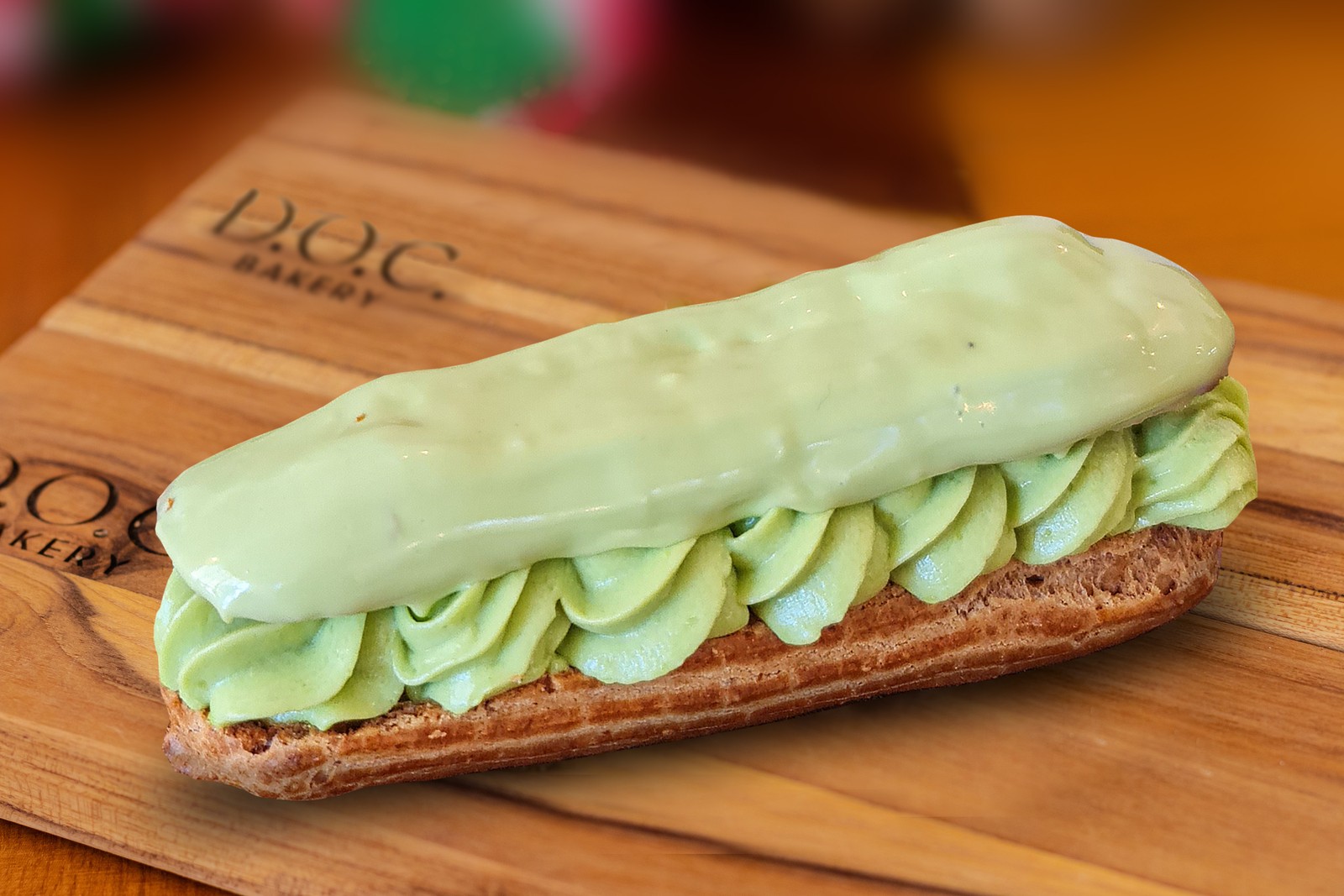 D.O.C Bakery. Éclair com massa de fermentação natural (R$ 19) e recheio de creme de pistache (R$ 19) da confeitaria francesa (99805-2016) no Recreio — Foto: Divulgação