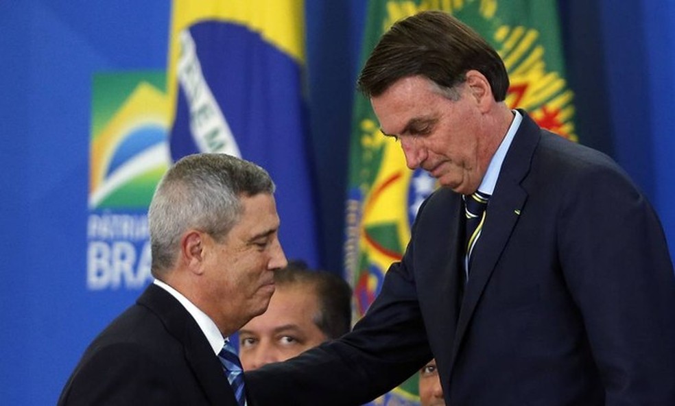 O presidente Jair Bolsonaro e o general Walter Braga Netto — Foto: Pablo Jacob/Agência O Globo