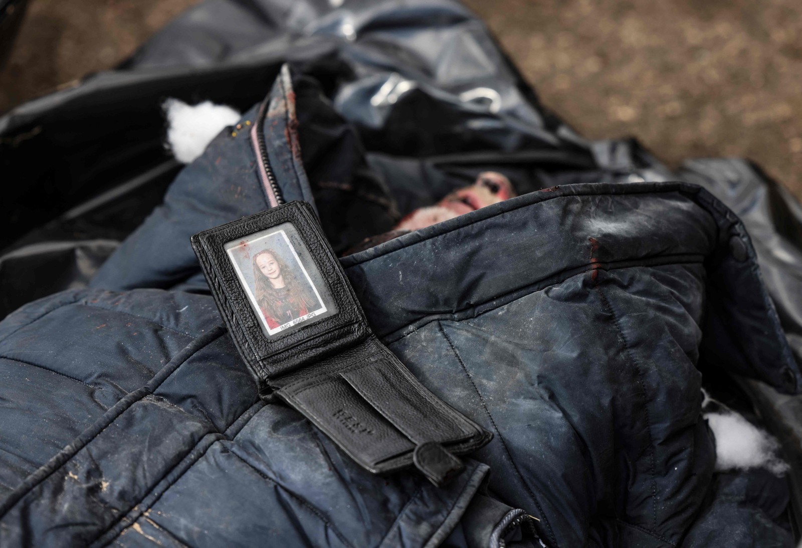 Corpo encontrado no porão de uma escola em Bucha — Foto: RONALDO SCHEMIDT / AFP