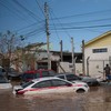 Carros submersos durante as enchentes no RS: indenizações pagas por seguros dobraram entre janeiro e maio - Carlos Fabal/AFP