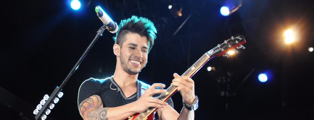 Gusttavo Lima durante show em Serra Dourada, Goiana, em 2012 — Foto: Nina Lima / Agência o Globo