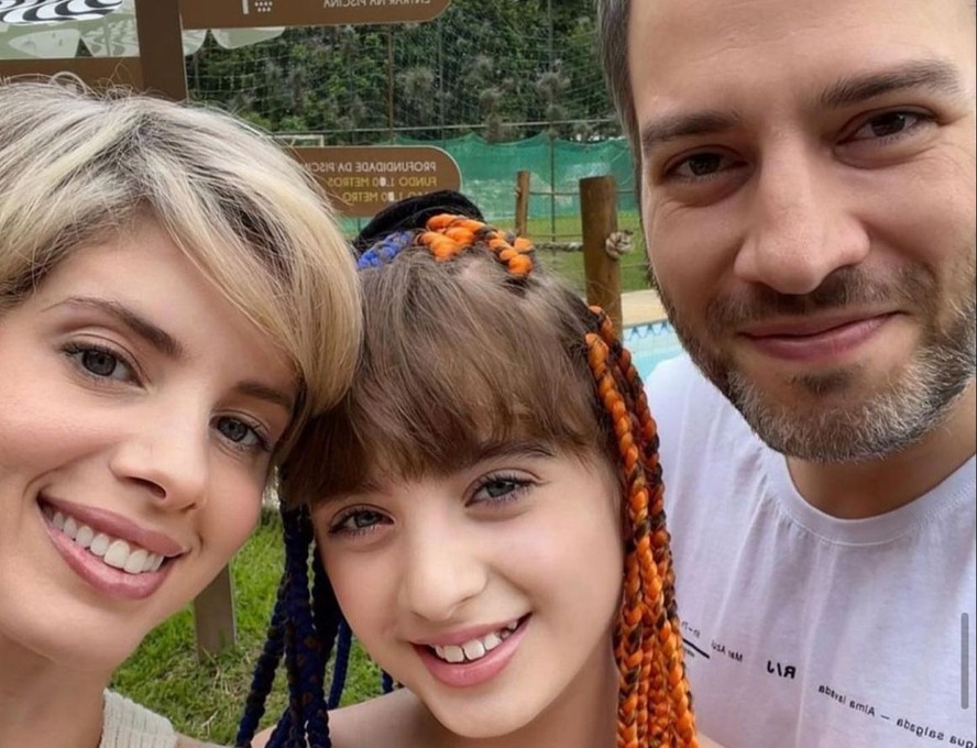 Dani Valente com o marido e filha