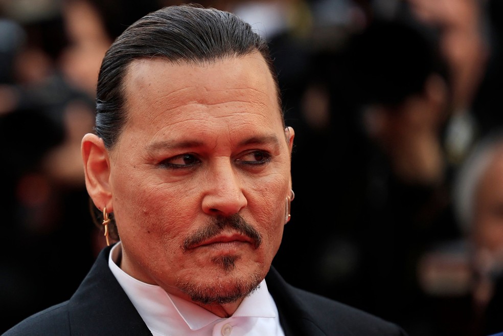 Johnny Depp no tapete vermelho do Festival de Cannes — Foto: Valery HACHE / AFP