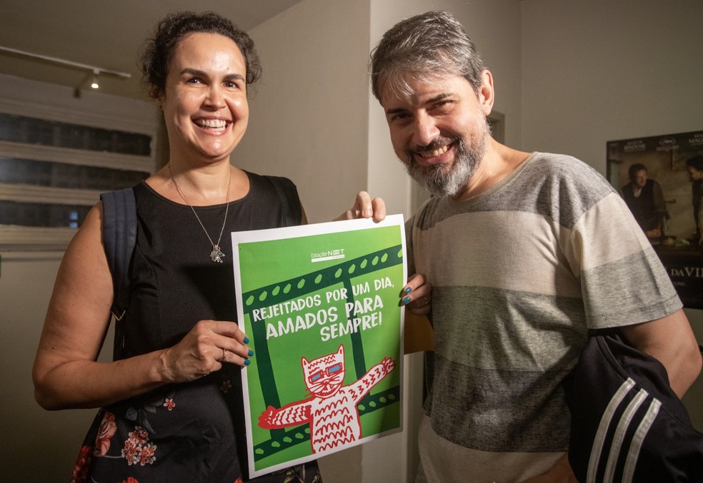O casal de dentista Luciana Licinio e Vitor Alencastro: presos no cinema — Foto: Ana Branco/Agência O Globo