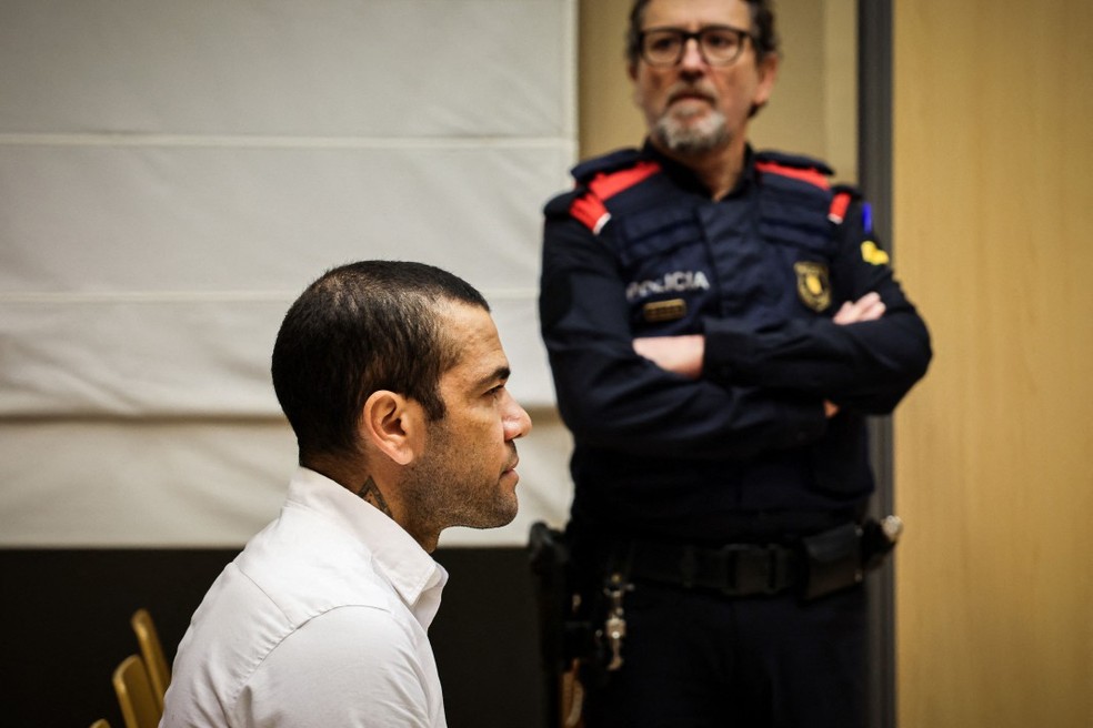 Daniel Alves: condenado por estupro — Foto: Jordi BORRAS / POOL / AFP