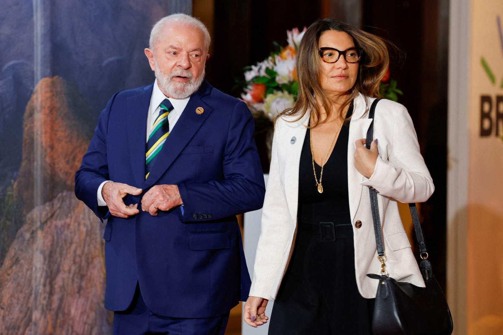 Presidente Lula e Janja chegam para reunião do BRICs — Foto: GIANLUIGI GUERCIA / POOL / AFP