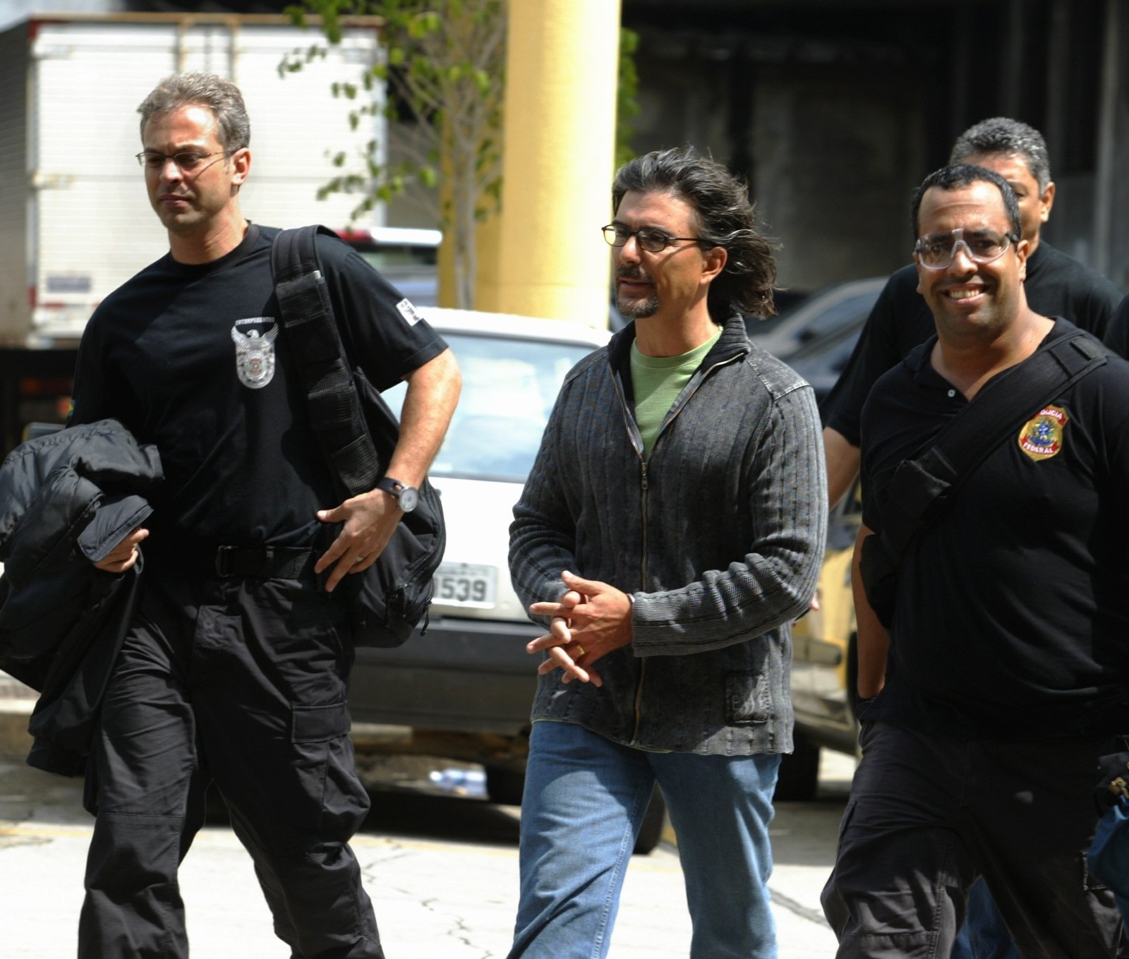 Rogério foi capturado em setembro de 2006com a fisionomia alterada: mais magro, tinha cabelos compridos e cavanhaque; ele ainda usava óculos e lentes de contato azuis — Foto: Ricardo Leoni / Agência O Globo