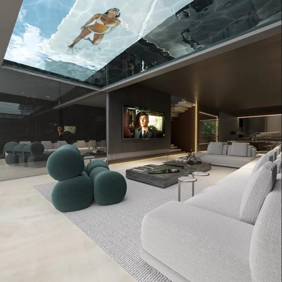Sala da nova casa de Léo Santana: piscina com fundo de vidro no teto — Foto: Reprodução/Instagram