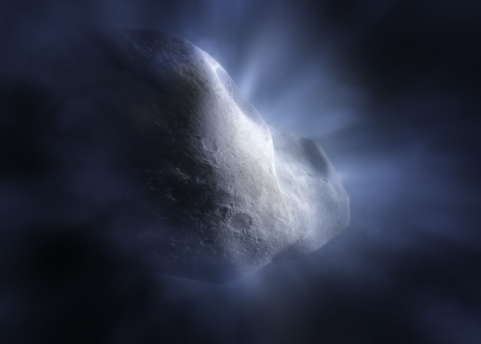 Conceito artístico do Cometa 238P/Read mostra o cometa do cinturão principal sublimando – seu gelo de água vaporizando conforme sua órbita se aproxima do sol. — Foto: NASA, ESA