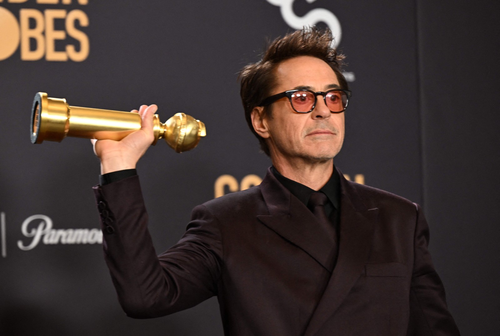 Robert Downey Jr. conquista o Globo de Ouro de melhor ator coadjuvante por "Oppenheimer" — Foto: Robyn BECK / AFP