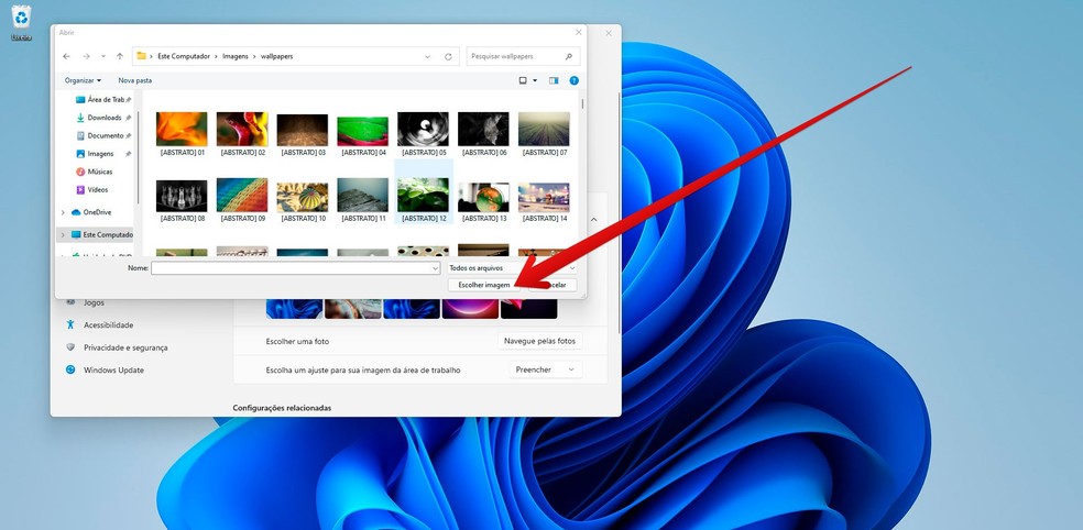 Escolha a imagem e confirme no botão indicado para mudar papel de parede do Windows 11 — Foto: Reprodução/Filipe Garrett