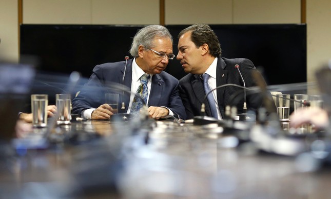 Guedes e o presidente da Caixa, Pedro Guimarães