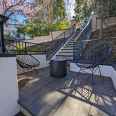 Stucco finished retaining walls and concrete pavers staircase