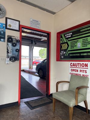 Photo of E-Z 10 Minute Oil Change - San Leandro, CA, US. Waiting room into the garage