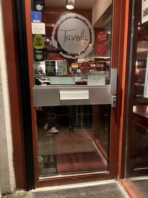 Photo of Tavola - Vancouver, BC, CA. the entrance to a restaurant