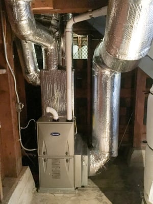 Photo of Ocean Air Heating - San Francisco, CA, US. Carrier 95% efficiency furnace installed under my stairs