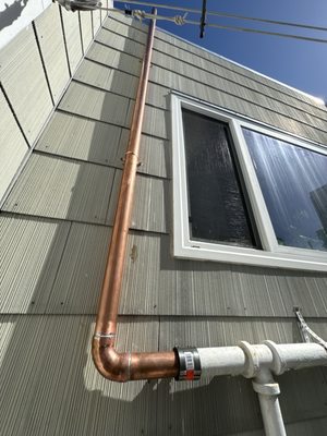 Photo of Eric Brand Plumbing - San Francisco, CA, US. New exhaust pipe on exterior of house.