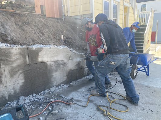 Photo of A&M Hauling & Demolition - San Francisco, CA, US. Breaking a wall of concrete