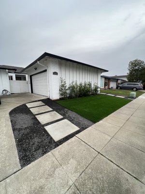 Photo of O.R Landscape & Maintenance - Colma, CA, US. Concrete walk way, artificial turf and garden bed