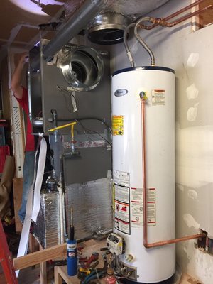 Photo of Phoenix Heating And Air Conditioning - San Leandro, CA, US. Central air furnace and AC installation in progress