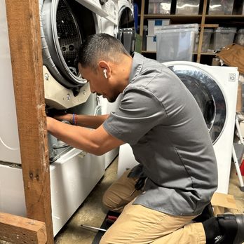 Cesar repairing Lg washing machine
