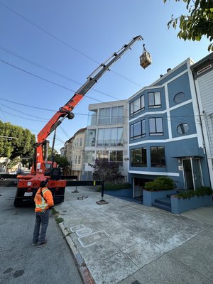 Photo of Ocean Air Heating - San Francisco, CA, US. Crane rental to put the central AC on the roof.