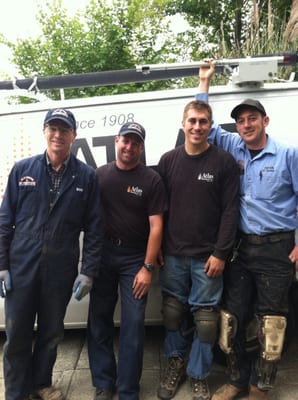 Photo of Atlas Heating - Oakland, CA, US. Christmas in August: Bob (owner), Ian, Josh and Kevin install new ducts for a 95 year old customer at no charge.  Helping out.