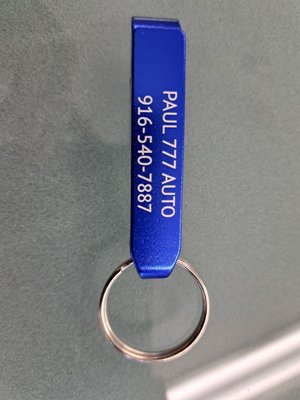 Photo of PAUL 777 AUTO REPAIR - Roseville, CA, US. Current Paul 777 swag given out to first time customers includes a bottle opener keychain.